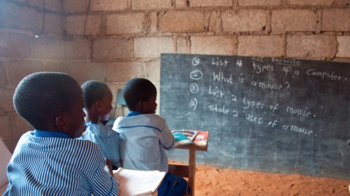 Students learn about computer skills in a classroom at Christ is the Answer Preparatory School in Adansi-Dompoase, outside Kumasi. According to school proprietor Anthony Kwasi Nyarku, private schools such as his are superior to Ghanaian public schools because the government-run schools are often under-supervised and a strong union protects the sometimes negligent teachers.