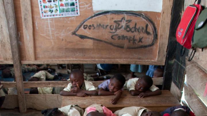 Children enjoy their naptime inside the kindergarten 1 and 2 classroom of Salomey Kortsu at Desmercy School.