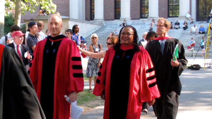 Dean of the Faculty of Arts and Sciences Michael D. Smith and dean of Harvard College Evelynn M. Hammonds, followed by dean of freshmen Thomas Dingman
