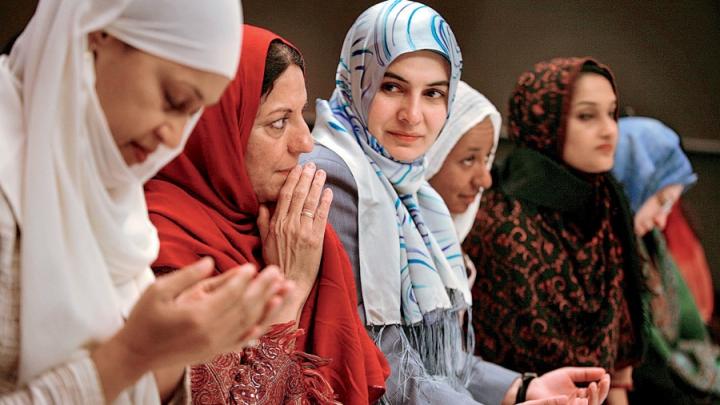 Wearing hijab, Muslim women from the United States and around the world meet in Manhattan in 2006 during the Women’s Islamic Initiative: Spirituality and Equity conference to discuss the issues and problems they face.