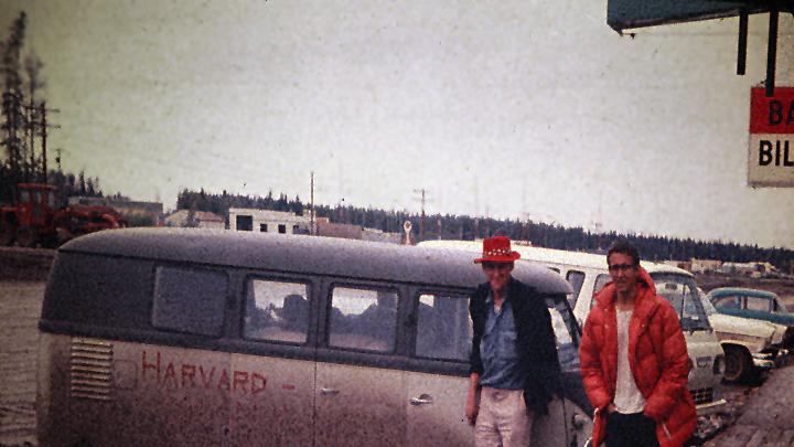 John Graham and David Roberts on the Alcan (Alaska-Canadian) Highway, en route to Mount McKinley, pose alongside the team’s VW Microbus.
