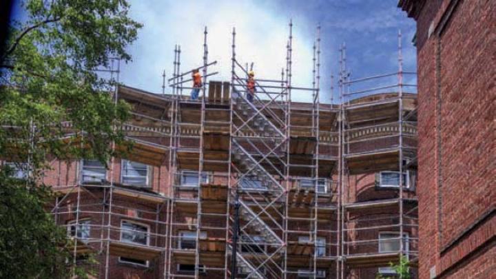 Photograph showing scaffolding for renovation of Harvard’s Adams House undergraduate residence