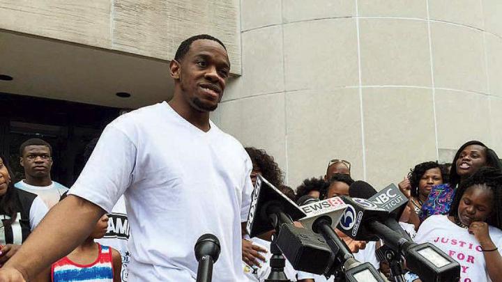 Photo of Bobby Johnson outside of Superior Court in New Haven on September 4, 2015, released from prison after nine years for a murder he did not commit