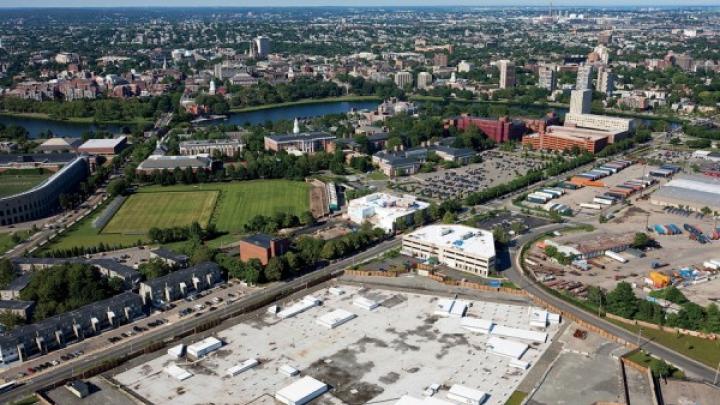 From a vantage point south of Western Avenue in Allston, looking northeast toward Harvard Square, the unfinished science complex dominates the foreground. Beyond it lie athletic fields that may yield to expansion by the School of Public Health, the Graduate School of Education, or other academic enterprises. A business “enterprise research campus” is envisioned south of Western Avenue, across from the high-rise graduate-student housing at One Western Avenue.
