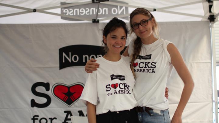 Rebecca Cooper (left) and Lily Erlinger at a Socks for America distribution event