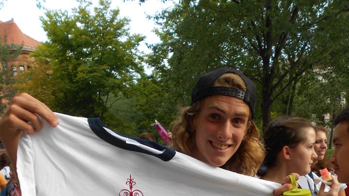 Canyon Woodward ’15 shows off the T-shirts distributed at the event, sporting the class color at the neck and sleeves.