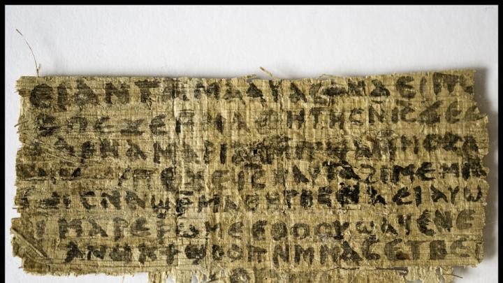 The front of a papyrus fragment from an early Christian codex on which is written a previously unknown gospel, the Gospel of Jesus's Wife.