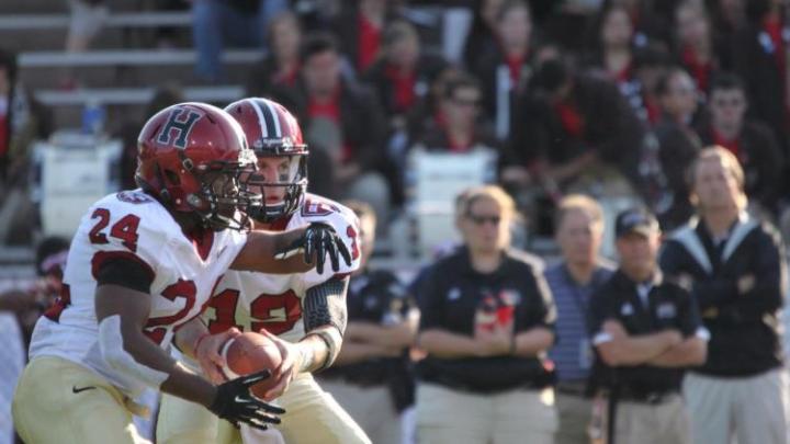 <b>One-two punch:</b> Between them, running back Treavor Scales (24) and quarterback Colton Chapple (19) accounted for six touchdowns in Harvard's 45-31 victory over Brown.