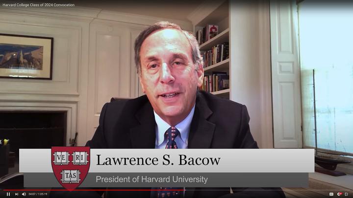 Photo of Harvard president Lawrence Bacow in his office