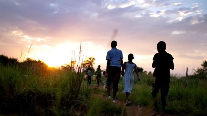 Children from New Hope orphanage in Busia, Uganda, make their nightly walk to get water for drinking and washing. They handle all the chores themselves—an important part of director Ken Mulago’s strategy for running the orphanage. “We want our children to behave as responsible adults,” he says. “We don’t want to raise them up just to think about themselves.”