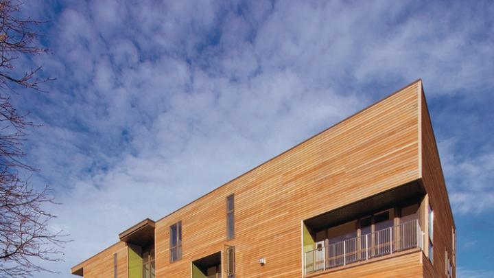 The award-winning Penn Street Lofts in Quincy, Massachusetts, include six residential units, each with its own balcony and pattern of windows.