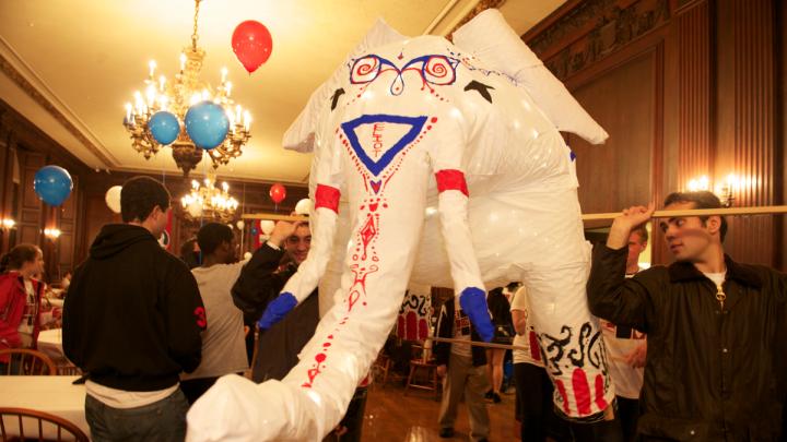 Students prepare the Eliot House elephant to appear in the 375th anniversary parade.