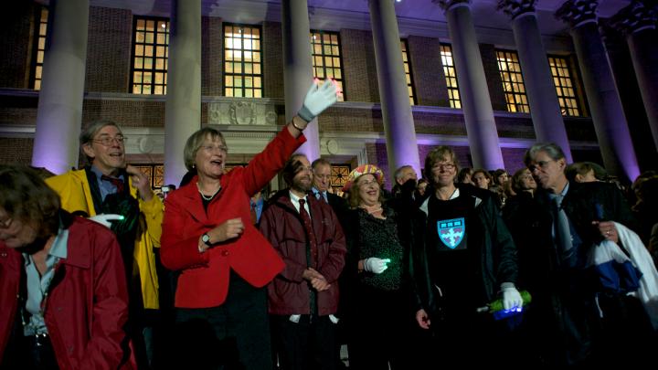 President Faust greets the Houses and graduate schools as they parade past Widener. To her right is Robert Reischauer, senior fellow of the Harvard Corporation. To her left are University provost Alan Garber; Leila Fawaz, president of the Board of Overseers; School of Engineering and Applied Sciences dean Cherry Murray; and School of Public Health dean Julio Frenk.