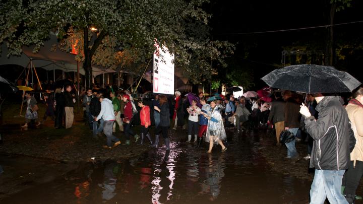 Just before the main ceremony was scheduled to begin, University Marshal Jackie O'Neill announced that a lightning storm was moving through the area, and instructed to partygoers to move indoors for safety's sake.