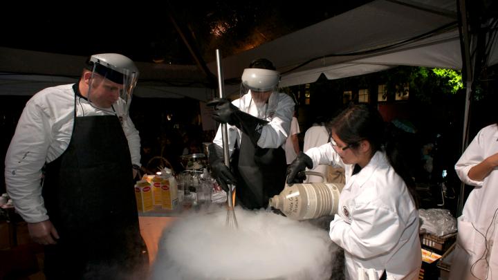 Students from the course Science of the Physical Universe 27: "Science and Cooking: From Haute Cuisine to Soft Matter Science" demonstrate making ice cream with liquid nitrogen, which brings the dessert to extremely cold temperatures and allows for using ingredients that would not otherwise freeze, such as alcohol. Throughout the evening, undergraduates were the centerpiece of the celebration.
