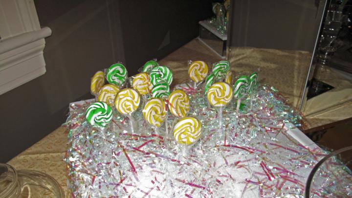 The green and yellow lollipops added flair to the candy table.