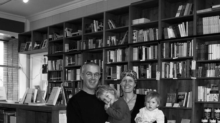 Happily at home: Brian Buckley, Katherine Hunter, and their children in the family’s poetry bookstore in Boulder.