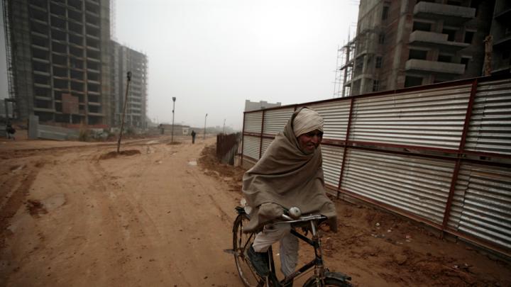 This construction site in Gurgaon, near Delhi, is part of India's building boom—and it is already home to construction workers, most of whom come from rural areas and have families in tow.