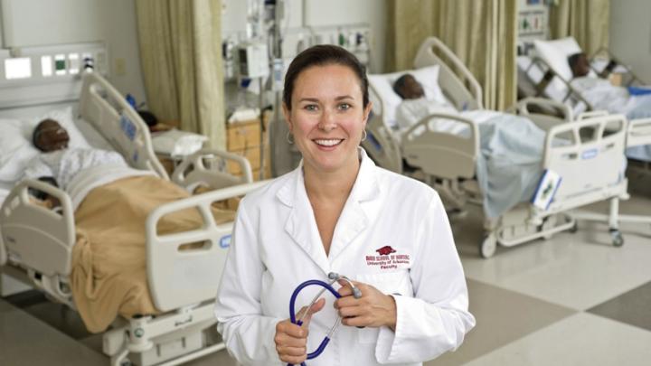 Cara Osborne, a certified midwife and professor, in a classroom (with medical training dummies) at the Eleanor Mann School of Nursing at the University of Arkansas at Fayetteville 