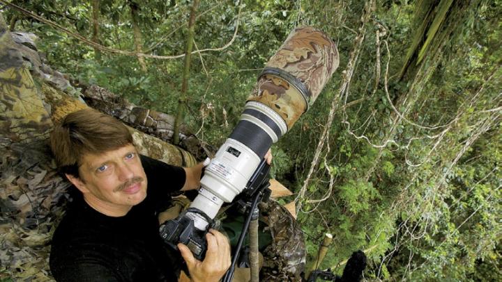 Photojournalist Tim Laman talks at the Harvard Museum of Natural History about his successful mission to capture on film all 39 known species of birds of paradise in the wild.
