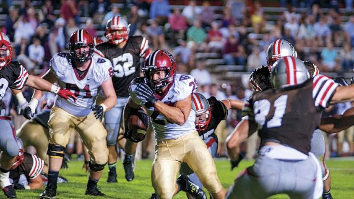 Ever in the Brown backfield, Scott Peters (44) and Connor Sheehan (50) headed a hard-hitting crew that limited the Bears to 88 yards on the ground.