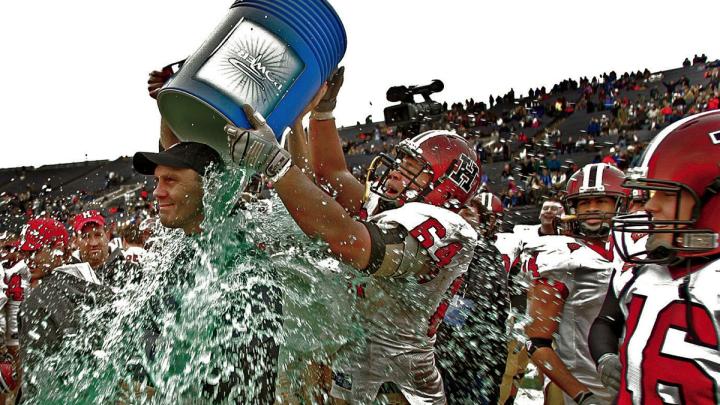 Familiar sights: Murphy received the celebratory traditional Gatorade shower after the 2007 win.