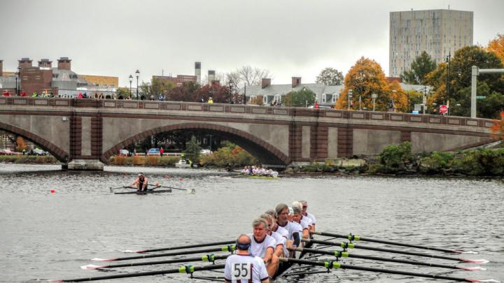 With Olmsted at stroke, the rowers set out from Newell Boathouse toward the starting line.