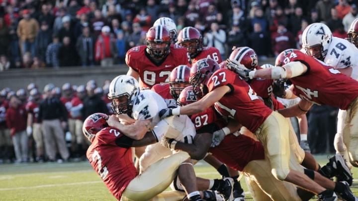 Halfback Alex Thomas was Yale’s heavy-duty rusher, carrying 23 times for 71 yards and three short-yardage touchdowns. On Yale’s last drive of the game, he was run down by a Harvard posse led by strong safety Jonathan Mason ’12 (2), end Chuks Obi ’11 (97), and free safety and captain Collin Zych ’11 (27).