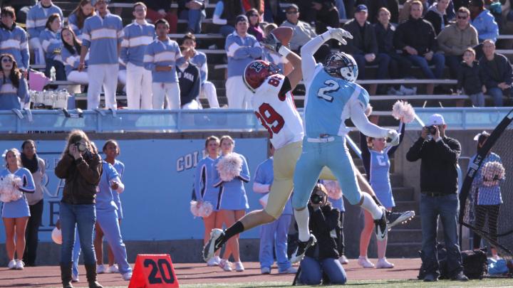 Receiver Chris Lorditch outjumped Columbia cornerback Brian DeVeau to snare a pass from quarterback Collier Winters in the third period of Saturday's game at Wien Stadium. Dodging two more Lion defenders, Lorditch dove into the end zone for a 41-yard touchdown, Harvard's fourth of the afternoon.