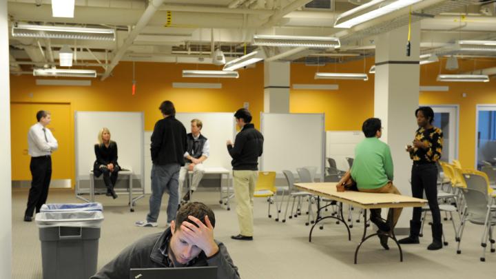 Users arrange themselves in the lab's flexible workspaces.