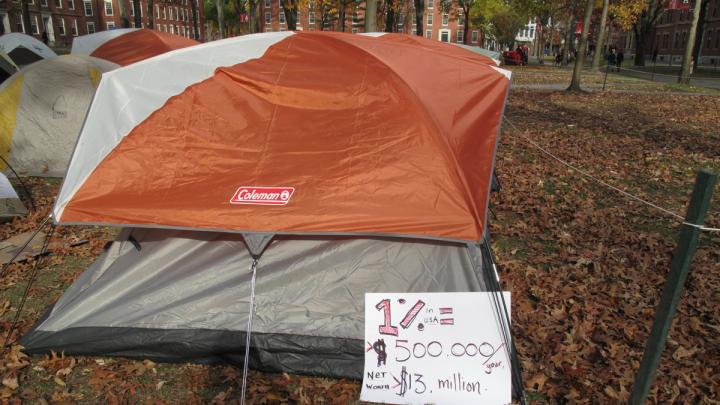 Many protesters attended classes today, but left signs outside of their tents.