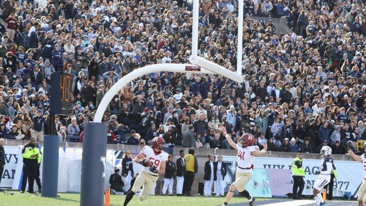 Harvard celebrates a touchdown in the endzone.
