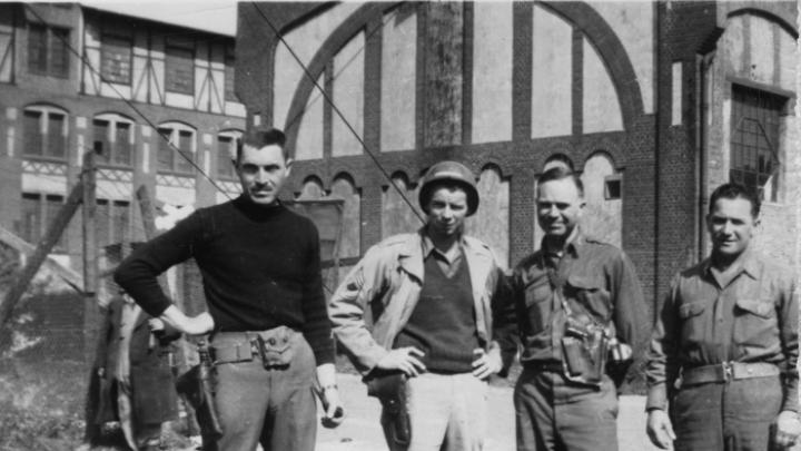 Monuments Men George Stout (at left) and Walter Hancock and Steven Kovalyak flank a fellow soldier in a May 1945 photograph.