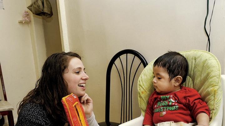 The social workers are concerned with child development, broadly defined: they recognize that professional and personal fulfillment supports maternal mental health. During the same visit, social worker Sarah McLanahan plays with Miguel.