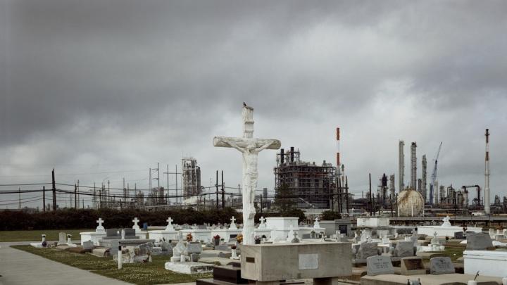 Old and new along the Mississippi: Holy Rosary Cemetery and Dow Chemical Corporation, Taft, Louisiana, 1998. From <i>Petrochemical America</i> 