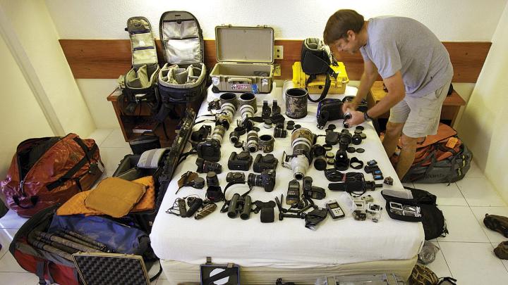 In Papua New Guinea, Tim Laman takes advantage of a rare hotel stop to dry out his 20 lenses, 4 camera bodies, audio and lighting gear, computers, and tree-climbing and camping equipment&mdash;not to mention his clothes and boots. 