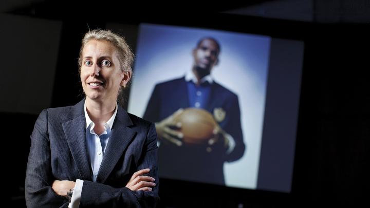 Anita Elberse, backed by a picture of basketball superstar LeBron James, an important figure in her book <i>Blockbusters</i> 