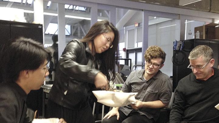 John Wang &rsquo;16 and Angie Jo &rsquo;16, at left, present a component of the cast arch they built in the construction lab to teaching assistant Alex Timmer and course head Mark Mulligan, far right.