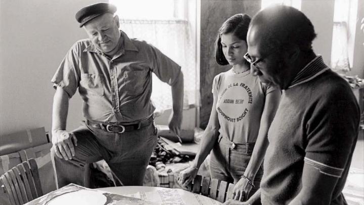 A 1975 photo of Bearden (at left) in his studio with photographer Jeanne Moutoussamy and master printmaker Robert Blackburn