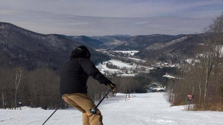 Skier in action at the top of a snow of snow-covered Berkshire East mountain 