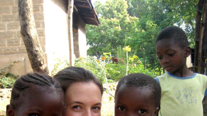 Theresa Betancourt with children in Sierra Leone
