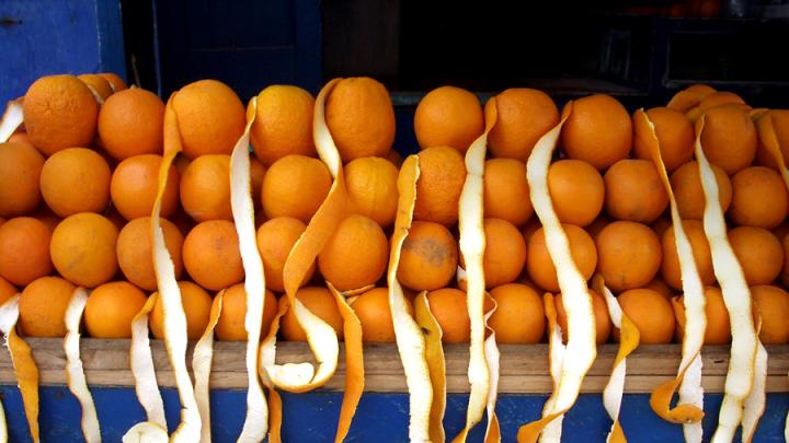 Oranges stacked for sale at a Moroccan bazaar