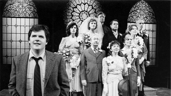 The opening wedding-party tableau of Durang’s 1985 play <em>The Marriage of Bette and Boo</em>. Durang (in the foreground as Matt) essentially played himself. He and director Jerry Zaks won Obie awards, and the 10-person cast won that year’s Obie for ensemble acting.
