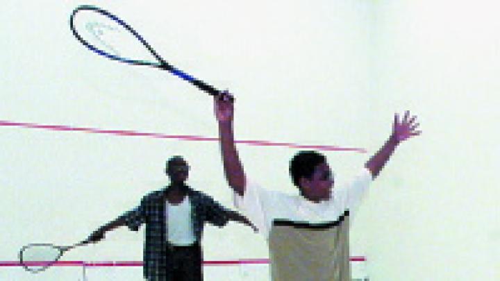 Two StreetSquash players square off for a match.