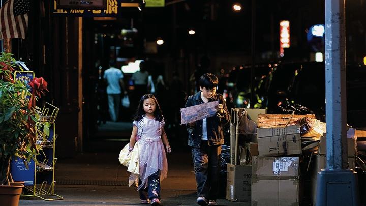 A production still from <i>Children of Invention,</i> with Crystal Chiu as Tina and Michael Chen as Raymond