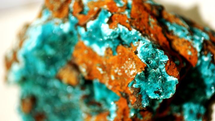 Blue-green aurichalcite on reddish gossan, from the Ojuela Mine in Mapimí, Durango, Mexico