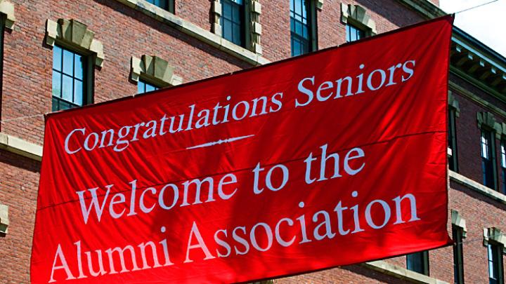 May 25, 2010 - Outside Memorial Church, a banner welcomes seniors assembled for the Baccalaureate service into the company of alumni.