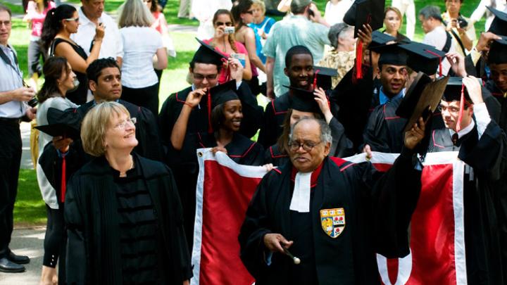 Photograph by Jim Harrison May 25, 2010 - President Drew Faust and the Reverend Peter J. Gomes lead seniors into Memorial Church for the Baccalaureate service.