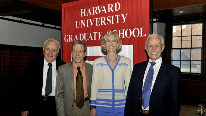 The Graduate School of Arts and Sciences awarded Centennial Medals to (from left) Stephen Fischer-Galati, Eric Maskin, Martha Nussbaum, and David Bevington.