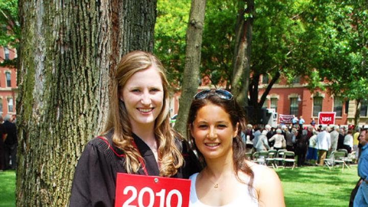 May 27, 2010 - Cabot House roommates Shawna Sinnott, of Boston, and Michelle Konstadt, of Armonk, New York, were the first members of the newest alumni class to arrive at its designated staging site for the alumni parade.